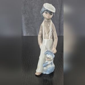 Casades Porcelain Boy Figurine with Blue Dog